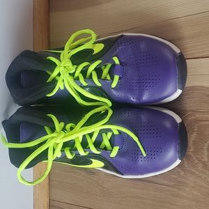 Nike girls size 3.5 basketball high tops purple &black with neon green laces.